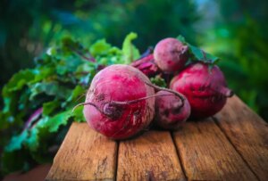 Fresh beetroots with leafy greens, perfect for a latte.