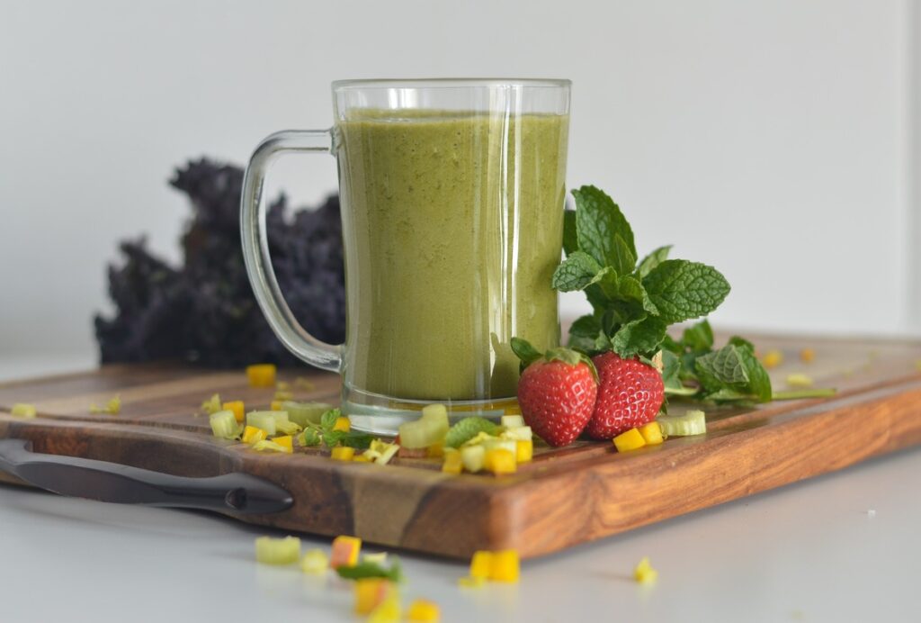 Bountiful display of fresh apples, root vegetables, lush greens ideal for spirulina smoothie health benefits.